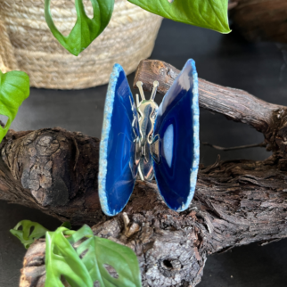 Agaat vlinder blauw, Agaat werkt aardend, stabiliserend en beschermend.